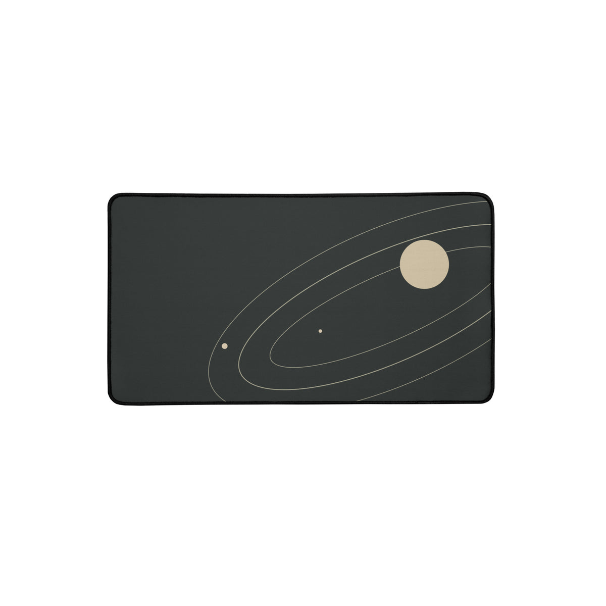 Orbit desk mat, elliptical lines on deep charcoal, 12 by 22 inches